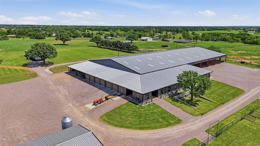 Premier, turnkey 37.66 Acre equine estate with exceptional facilities & unmatched infrastructure. Step into a world class equine operation designed for professionals who demand excellence. This fully equipped property blends high end functionality with thoughtful amenities, offering everything needed for training, breeding, boarding, or showcasing horses at the highest level. The show barn is a trainer’s dream! Professionally designed, 25 stall barn built for efficiency, comfort, and performance. 13-12x14 and 12-12x12 stalls each with automatic waterers, feeders, feed doors, fans, electrical outlets, and individual shut-off switches. Automatic fly spray system.  2 wash racks plus a convertible double stock area. Tack room, feed room, and full laundry with washer & dryer. 6 roll up doors for exceptional ventilation and workflow. Concrete loading dock with easy trailer-spreader access. Half bath and a comfortable lounge-office.  Year-round training with a 125x250 Indoor Arena with a 6 horse Priefert walker and 52’ round pen (both negotiable).  Hay & Feed Storage - 35x60 hay barn, a grain silo, and an adjacent cinder block manure dump pit. 4 large pastures are designed for horse health & safety. Each with catch pens, stocks, loafing sheds, and automatic waterers. Laneways for easy movement and management, connecting gates for flexible pasture configuration. 10 tie poles positioned above the pastures. Three large turnouts near the show barn, each with automatic waterers. Additional unfenced pasture area with water lines NW of the barn - ideal for expansion or future building. The main residence is move in ready with beautiful, panoramic views at 1191 sq ft, 2 beds, 2 baths and an office. Updated in 2024 including a new roof. Detached two car garage with electricity, water, and optional laundry-bath hookups.  Covered flagstone breezeway. Mobile Home is ideal for staff at 3 beds, 2 baths with a large deck. Too much to list. Move in today, start working tomorrow!
