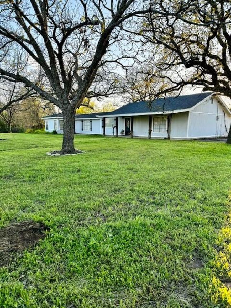 This is a rare opportunity 3.7 acres in town. Enjoy country living with a view in the City limits. Large pond and creek in back of property.   NEW owner can also subdivide and sell lots separately.  
Lots of updates, call for more details and a showing.