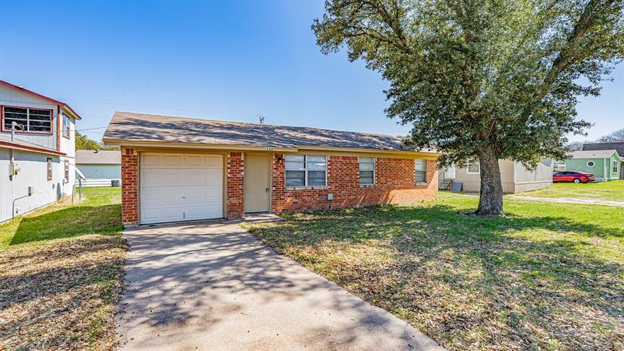ATTENTION FIRST TIME HOME BUYERS, INVESTORS OR DOWNSIZERS- THIS IS THE HOME YOU HAVE BEEN WAITING FOR! PRICED RIGHT AT AN UNBEATABLE PRICE- CHEAPER THAN RENT! Super cute brick facing three bedroom home in Pelican Bay a quiet suburb close to Azle. Enjoy endless wildlife. Feed the peaceful and serene deer that have called this area their home. Walk to the lake and drop a fishing pole. Boat ramp less than 2 minutes away! Make this your weekend getaway or your next nightly rental. Live here and enjoy the peace and serenity that surrounds this area. The possibilities are endless!  Ideal for everyone! Discover comfort and charm in this delightful 3 bedroom - 1 bath home. With an open floor plan, this home feels bright and airy, offering a seamless flow from living to dining to kitchen, perfect for everyday living and entertaining. The 1 car garage provides convenient storage and also serves a laundry area with washer and dryer hookups. The spacious yard offers room to relax or create your ideal outdoor space.  Situated within Azle ISD and with no HOA, this home is a fantastic opportunity for everyone! Don't miss out on this gem!

No survey available. Sold As-Is, seller will not make any repairs.