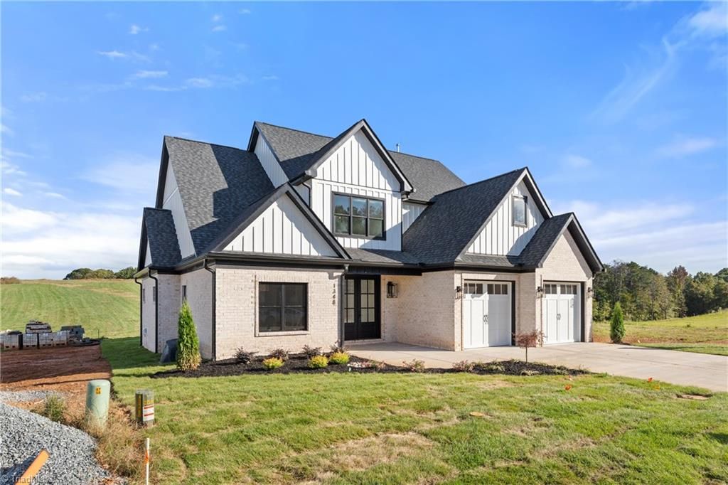 Photo of 1348 Maple Chase Lane, Winston-Salem, NC 27106 (MLS # 1172773)