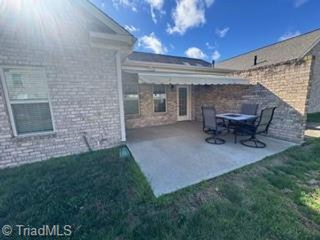 Photo of 1907 Whisper Lake Drive #B, Whitsett, NC 27377 (MLS # 1212973)