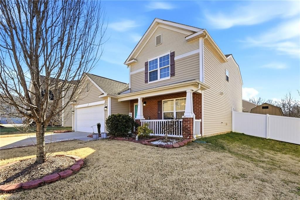 Photo of 730 Traveller Drive, Whitsett, NC 27377 (MLS # 1207853)