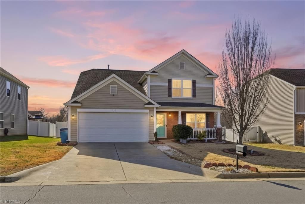 Photo of 730 Traveller Drive, Whitsett, NC 27377 (MLS # 1207853)