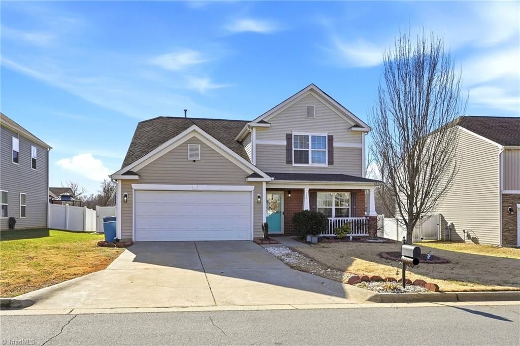 Photo of 730 Traveller Drive, Whitsett, NC 27377 (MLS # 1207853)