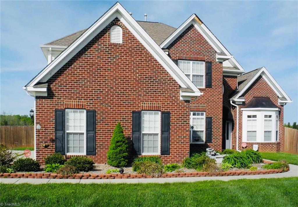 Photo of 202 Club Square, Whitsett, NC 27377 (MLS # 1237825)