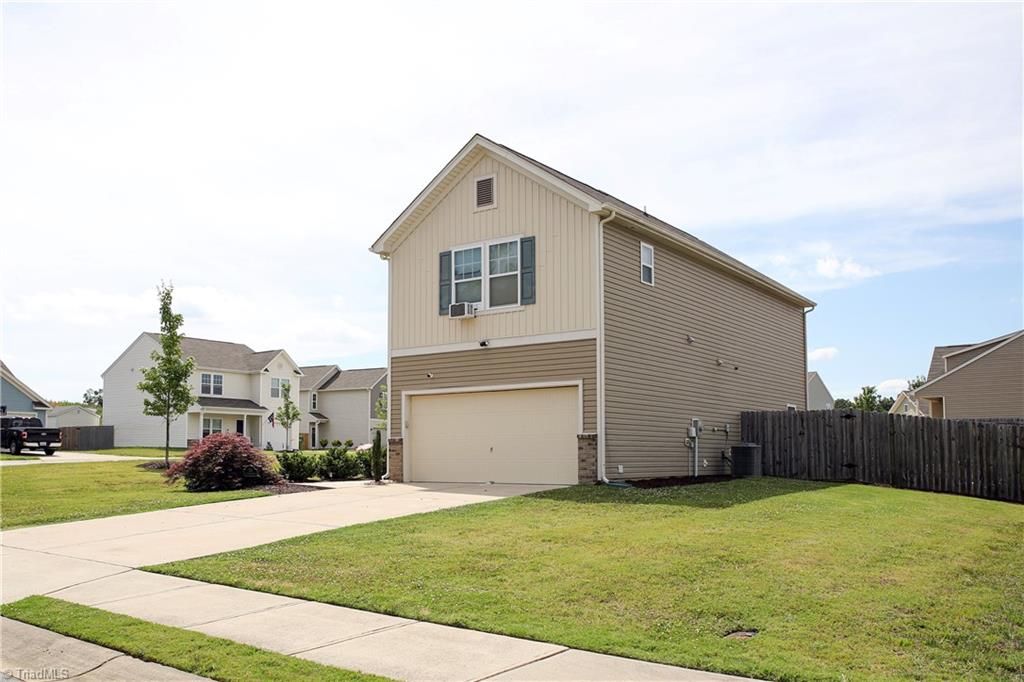 Photo of 336 Joe Gibson Drive, Gibsonville, NC 27249 (MLS # 1225032)
