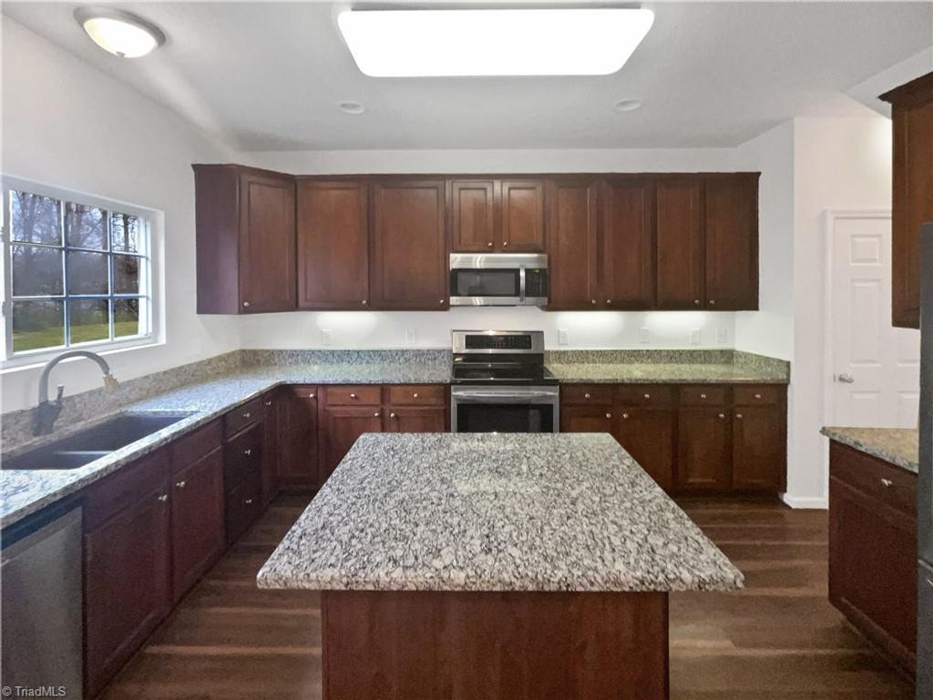 Photo of 1312 Sharp Ridge Road, Greensboro, NC 27406 (MLS # 1204224)