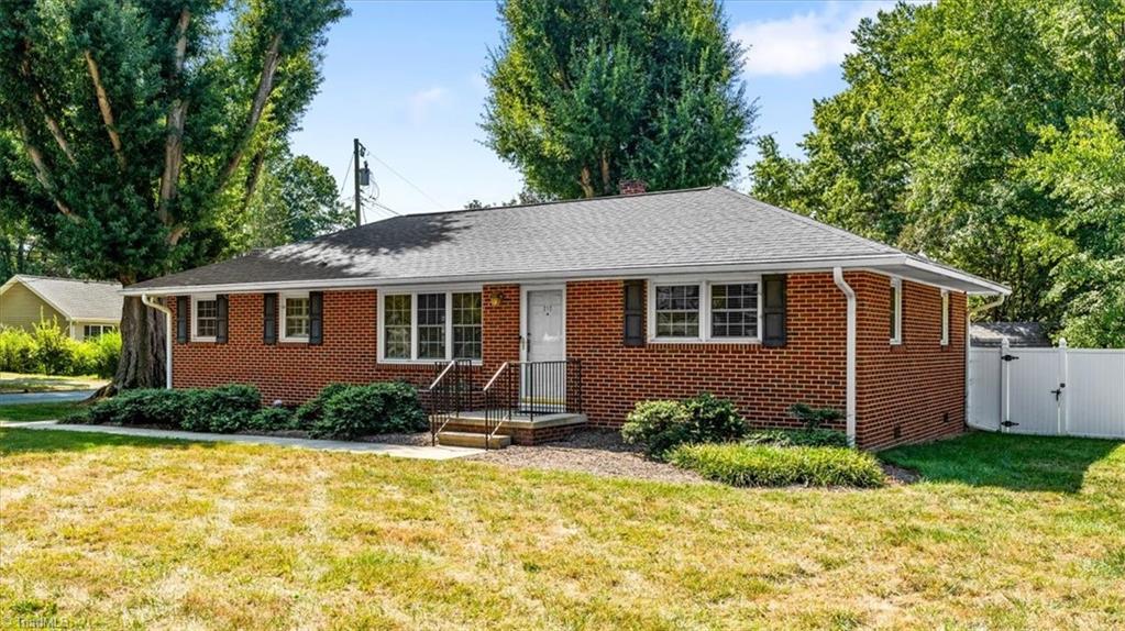 Photo of 212 W Gilbreath Street, Graham, NC 27253 (MLS # 1236529)