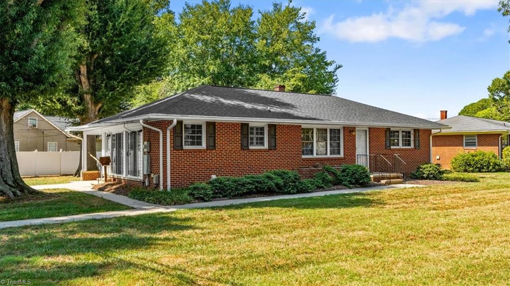 Photo of 212 W Gilbreath Street, Graham, NC 27253 (MLS # 1236529)