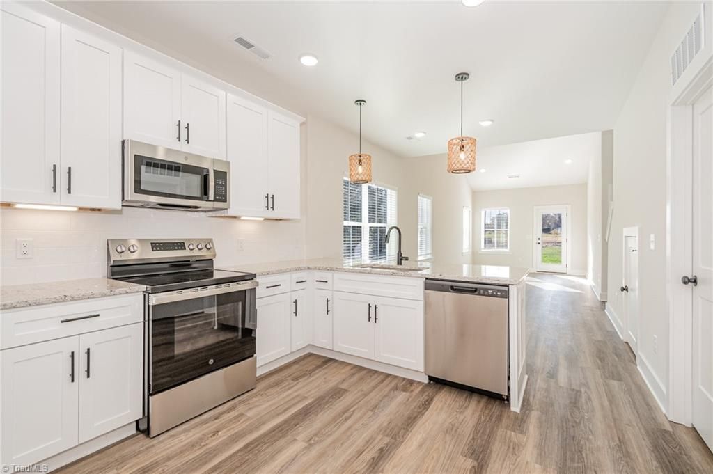 Photo of 3609 Bridleton Ridge Trail, Greensboro, NC 27410 (MLS # 1217354)