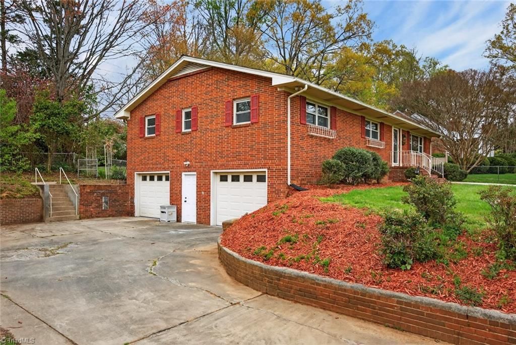 Photo of 113 Green Valley Road, Greensboro, NC 27408 (MLS # 1214042)
