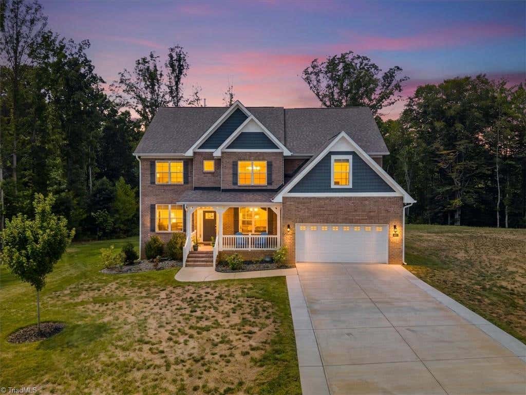 Photo of 4601 Thatcher Woods Drive, Oak Ridge, NC 27310 (MLS # 1229455)