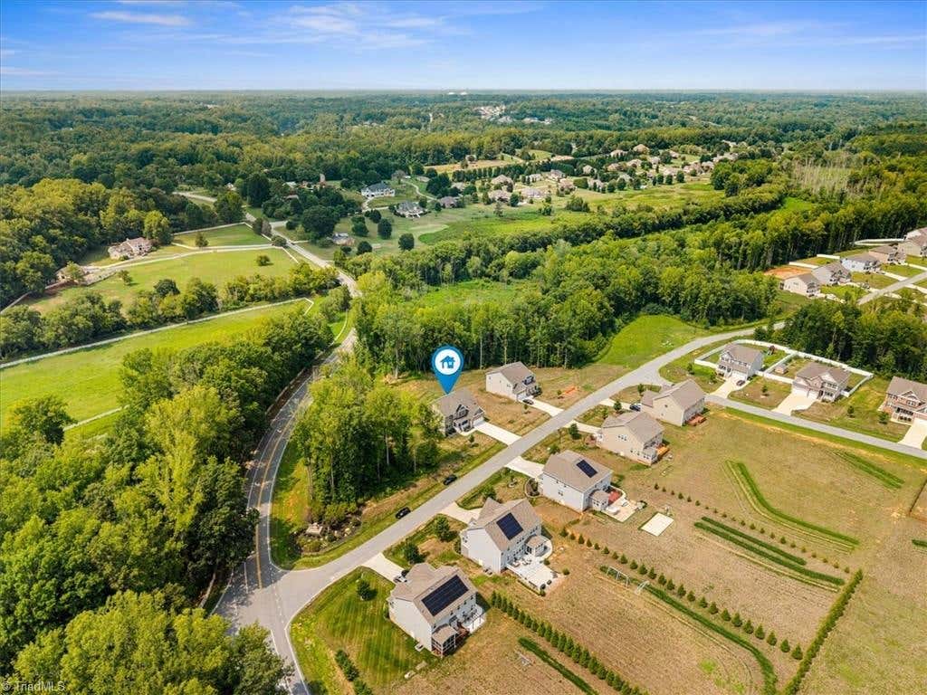 Photo of 4601 Thatcher Woods Drive, Oak Ridge, NC 27310 (MLS # 1229455)