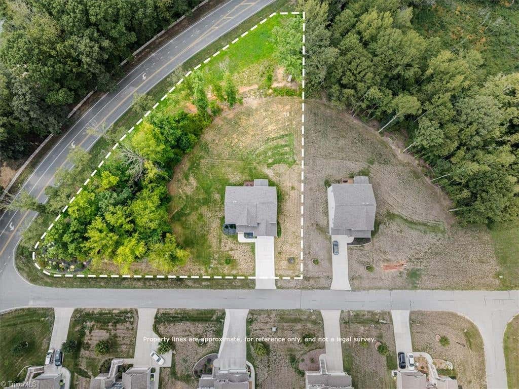 Photo of 4601 Thatcher Woods Drive, Oak Ridge, NC 27310 (MLS # 1229455)