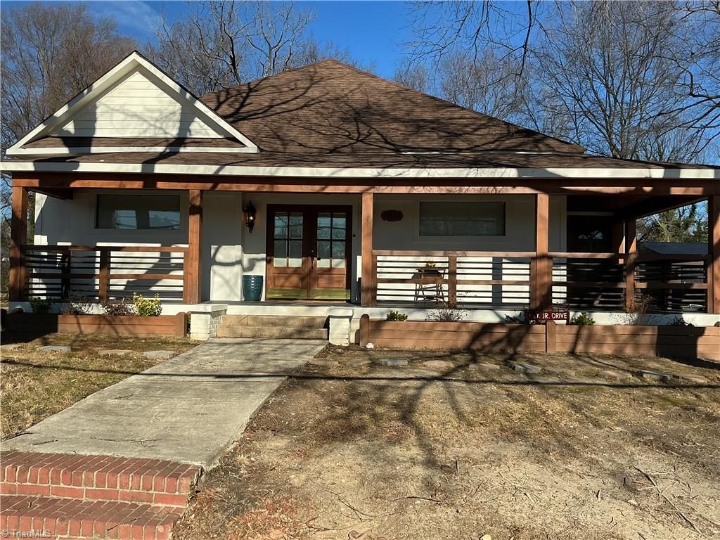 Photo of 1813 Martin Luther King Jr Drive, Greensboro, NC 27406 (MLS # 1211033)