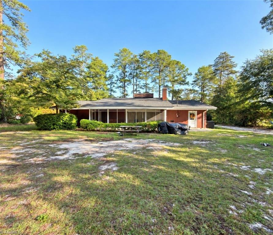 Photo of 324 E Main Street, Candor, NC 27229 (MLS # 1236309)