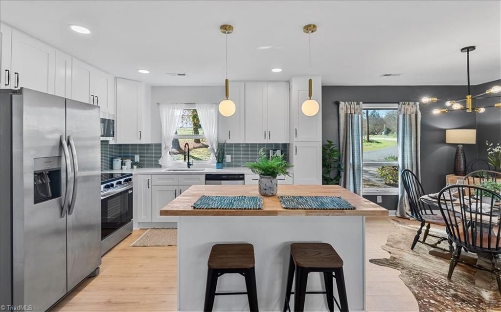 Photo of 219 Tarheel Drive, Archdale, NC 27263 (MLS # 1212157)