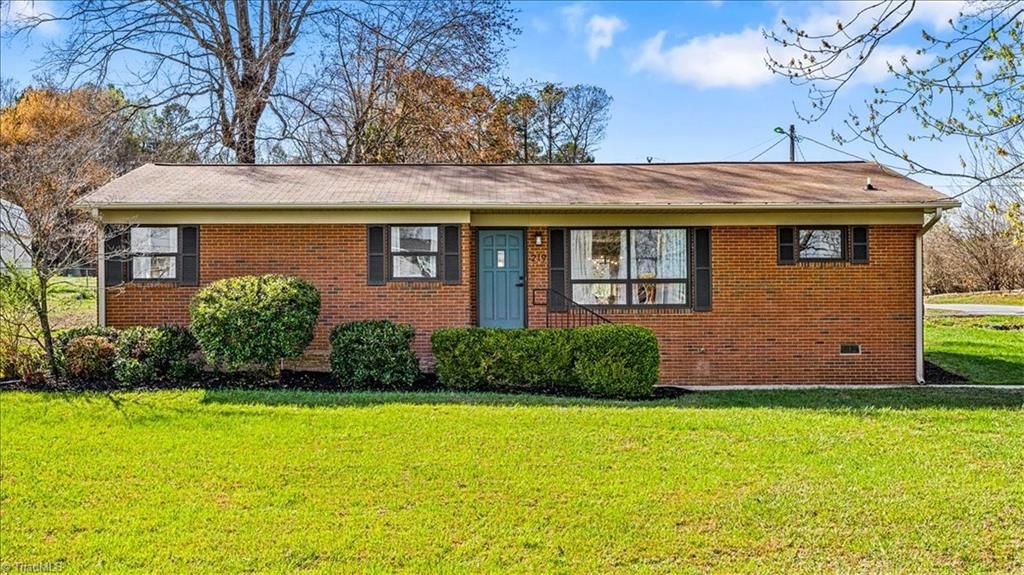 Photo of 219 Tarheel Drive, Archdale, NC 27263 (MLS # 1212157)