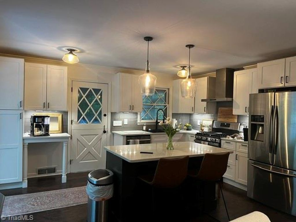 Photo of 410 N Gordon Drive, Winston-Salem, NC 27104 (MLS # 1222083)