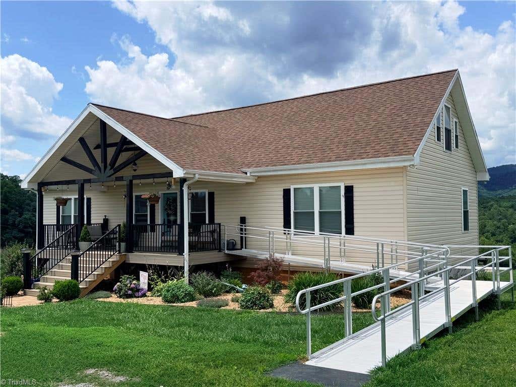 Photo of 310 Triple Creek Drive, Traphill, NC 28685 (MLS # 1226120)
