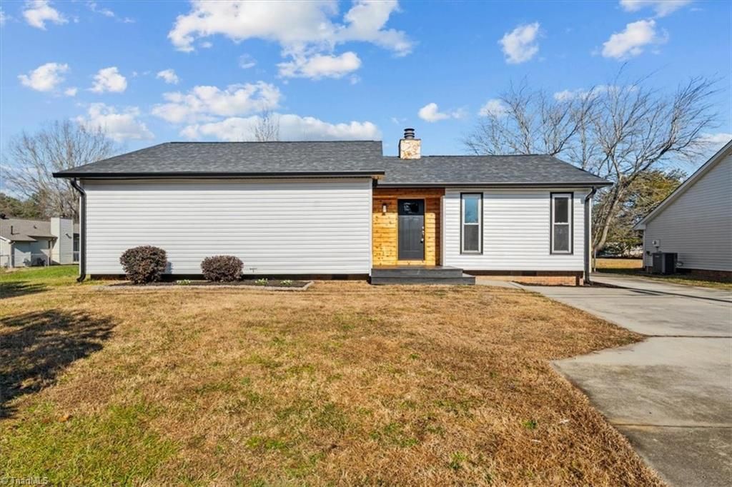 Photo of 303 E Vandalia Road, Greensboro, NC 27406 (MLS # 1203666)