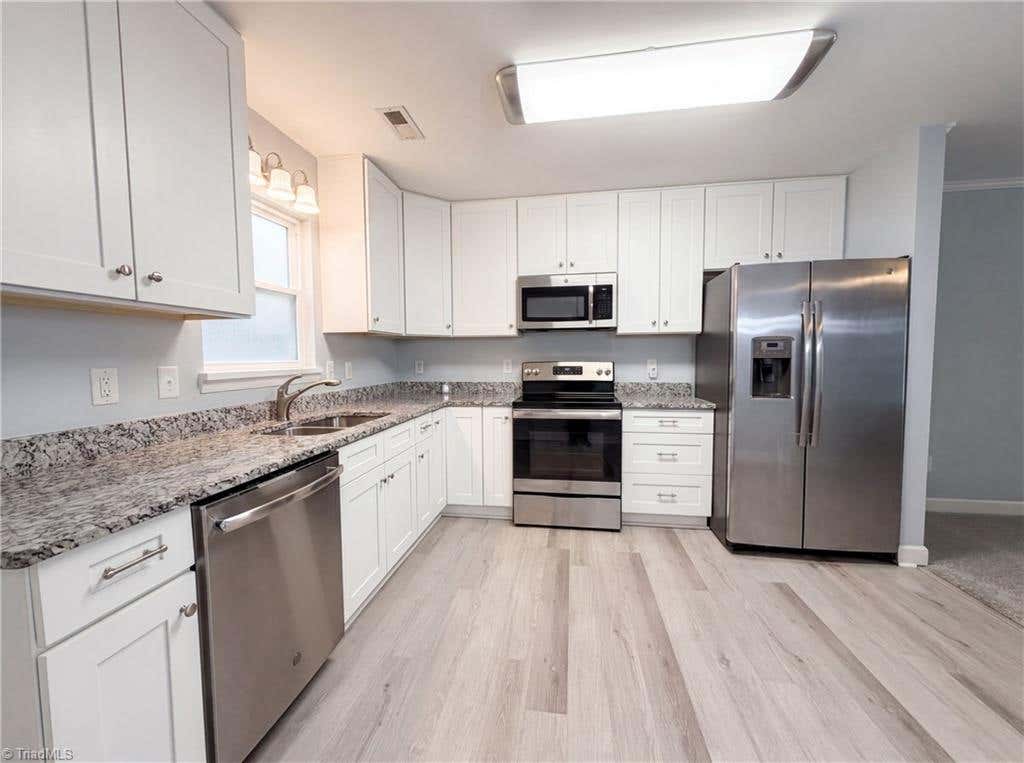 Photo of 304 Field Street, Graham, NC 27253 (MLS # 1225156)