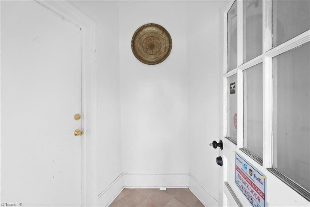 Photo of 910 Merritt Drive, Greensboro, NC 27407 (MLS # 1200387)