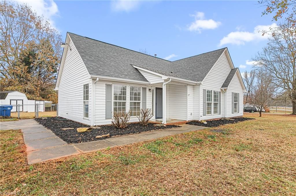 Photo of 111 W Butler Avenue, Liberty, NC 27298 (MLS # 1203605)