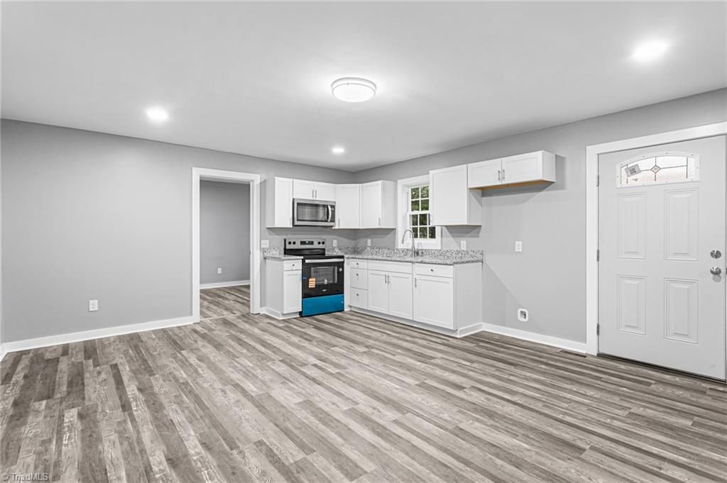 Photo of 424 Rocky Knoll Road, Greensboro, NC 27406 (MLS # 1203457)