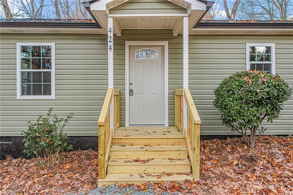 Photo of 424 Rocky Knoll Road, Greensboro, NC 27406 (MLS # 1203457)