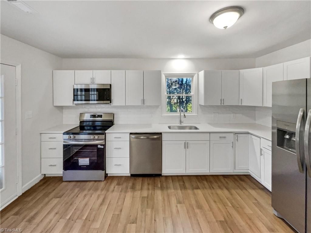 Photo of 10 Brownstone Lane, Greensboro, NC 27410 (MLS # 1205727)