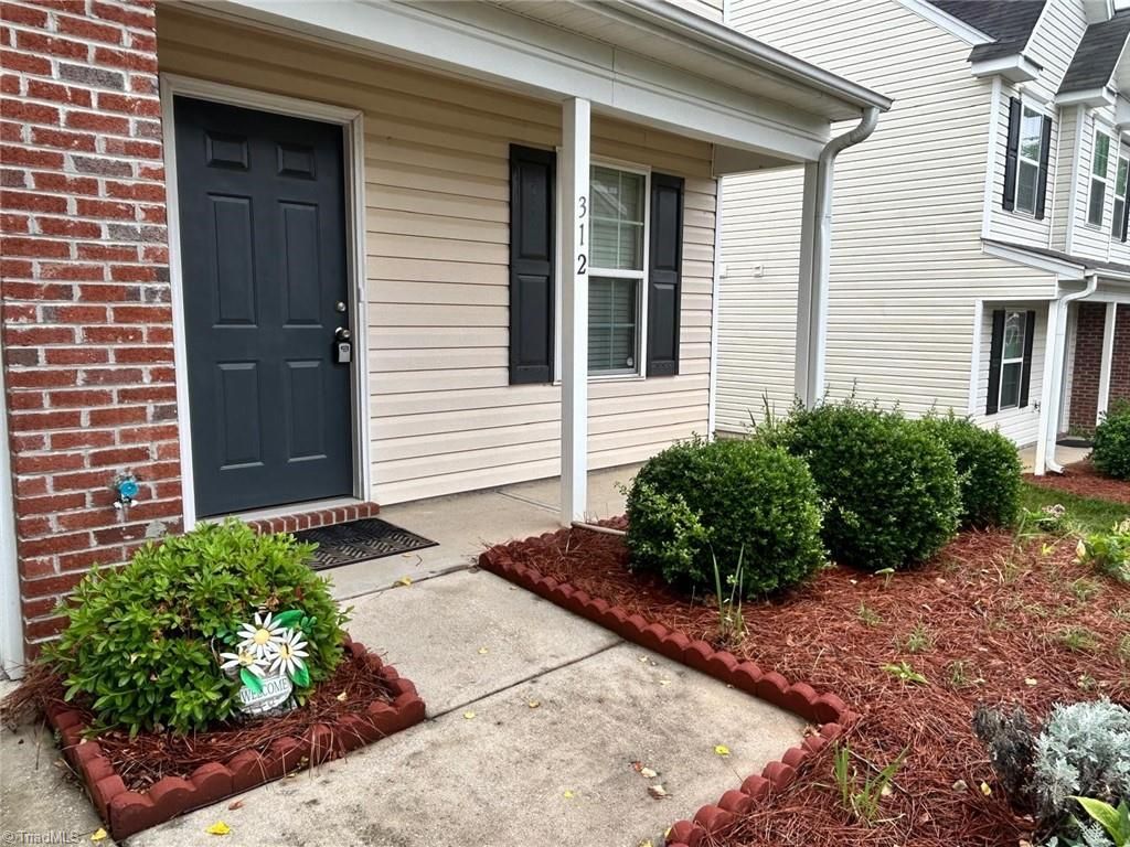 Photo of 312 Robyns Glen Circle, Greensboro, NC 27409 (MLS # 1221946)