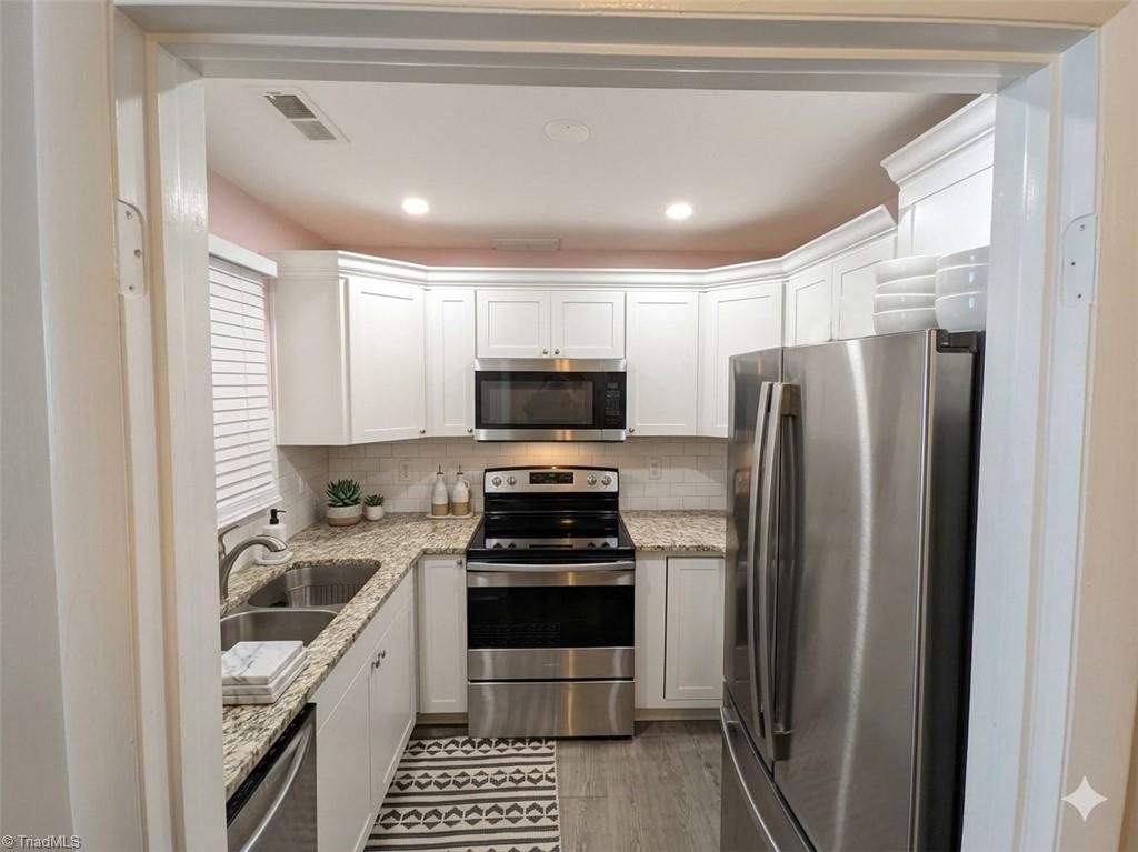 Photo of 311 Salisbury Street #58, Kernersville, NC 27284 (MLS # 1221988)