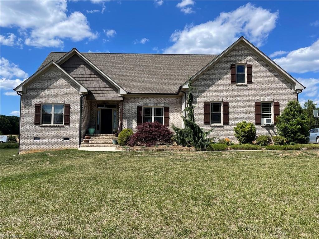Photo of 8128 BELEWS CREEK Road, Stokesdale, NC 27357 (MLS # 1219629)