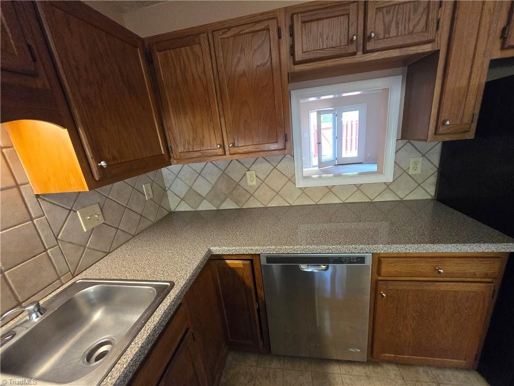 Photo of 15 Collwood Court, Greensboro, NC 27409 (MLS # 1218187)