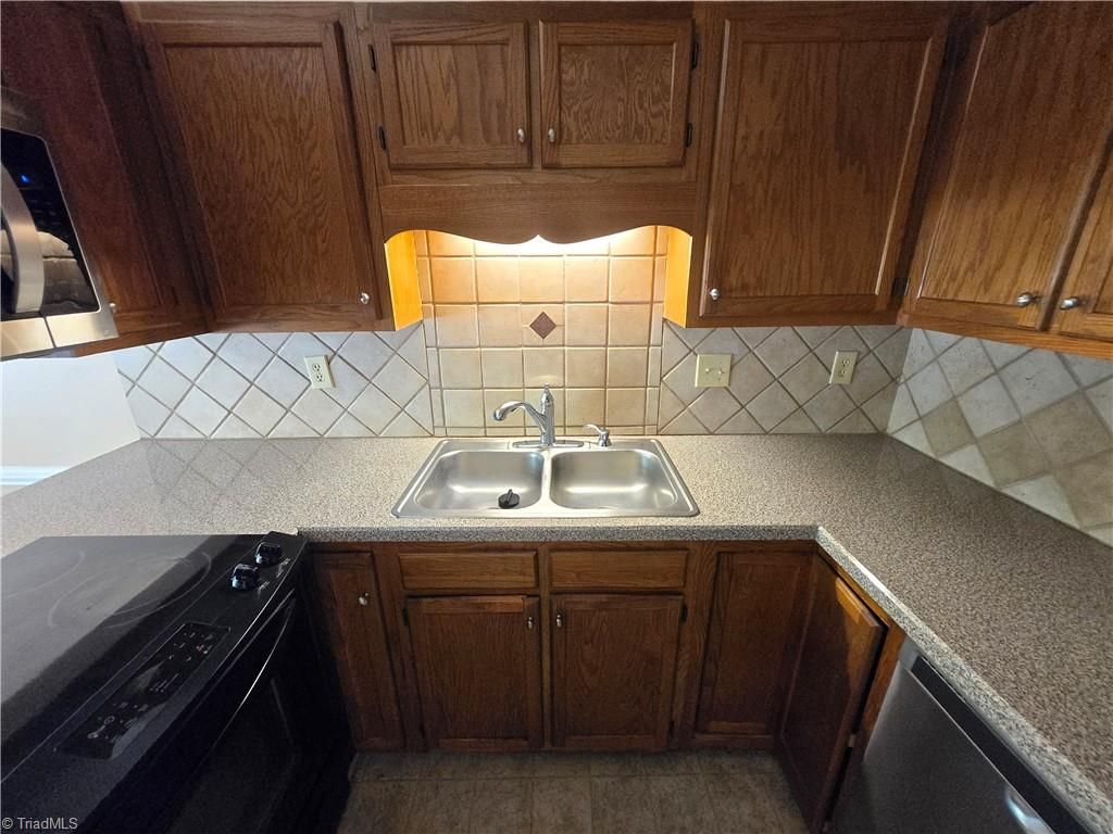 Photo of 15 Collwood Court, Greensboro, NC 27409 (MLS # 1218187)