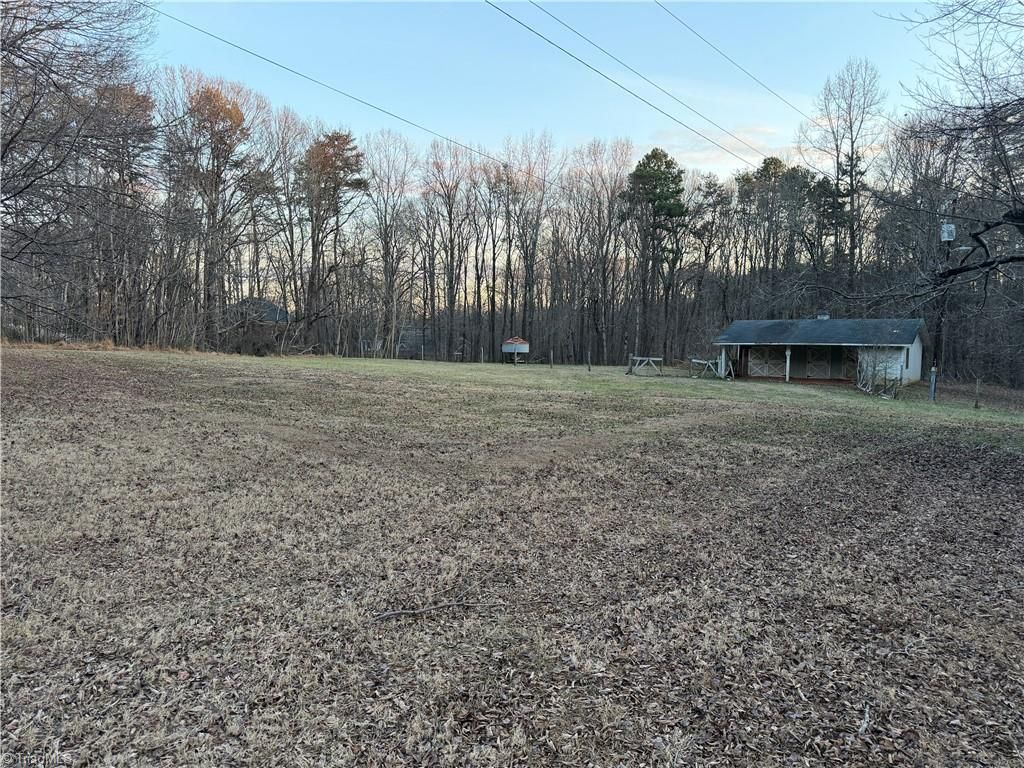 Photo of 5005 Northbend Road, McLeansville, NC 27301 (MLS # 1206767)