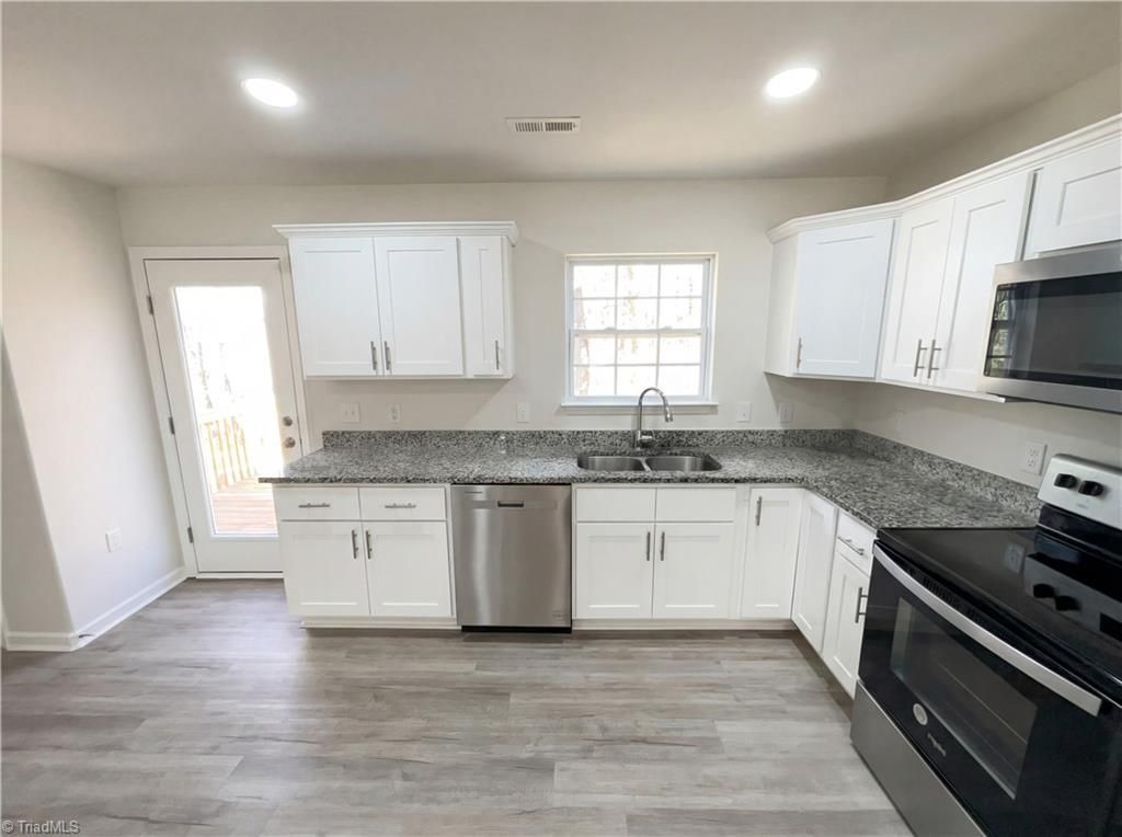 Photo of 4694 Coltsfoot Road, Greensboro, NC 27455 (MLS # 1209464)