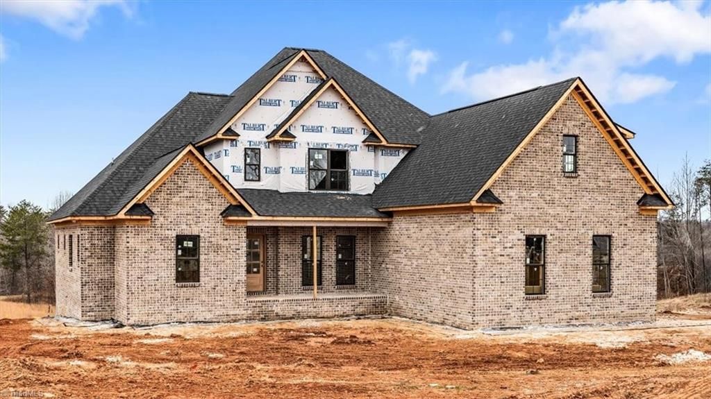 Photo of 2015 Bob Jessup Drive, Greensboro, NC 27455 (MLS # 1207080)