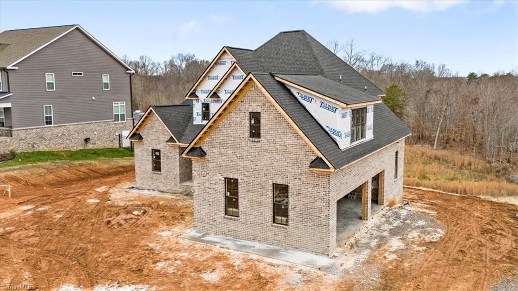 Photo of 2015 Bob Jessup Drive, Greensboro, NC 27455 (MLS # 1207080)