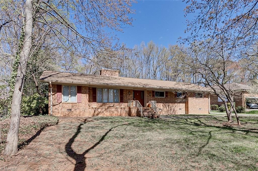 Photo of 215 Pineburr Road, Greensboro, NC 27455 (MLS # 1212858)