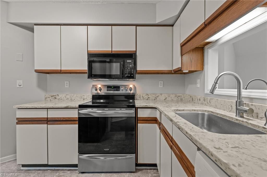 Photo of 19 Milpond Lane, Greensboro, NC 27455 (MLS # 1211385)