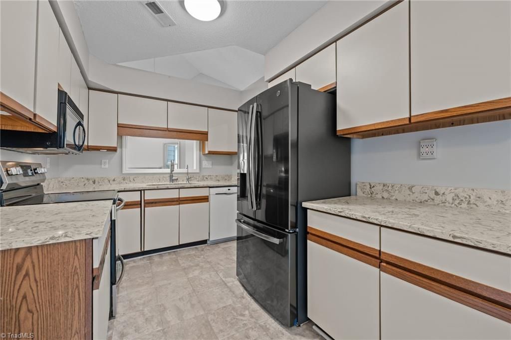 Photo of 19 Milpond Lane, Greensboro, NC 27455 (MLS # 1211385)