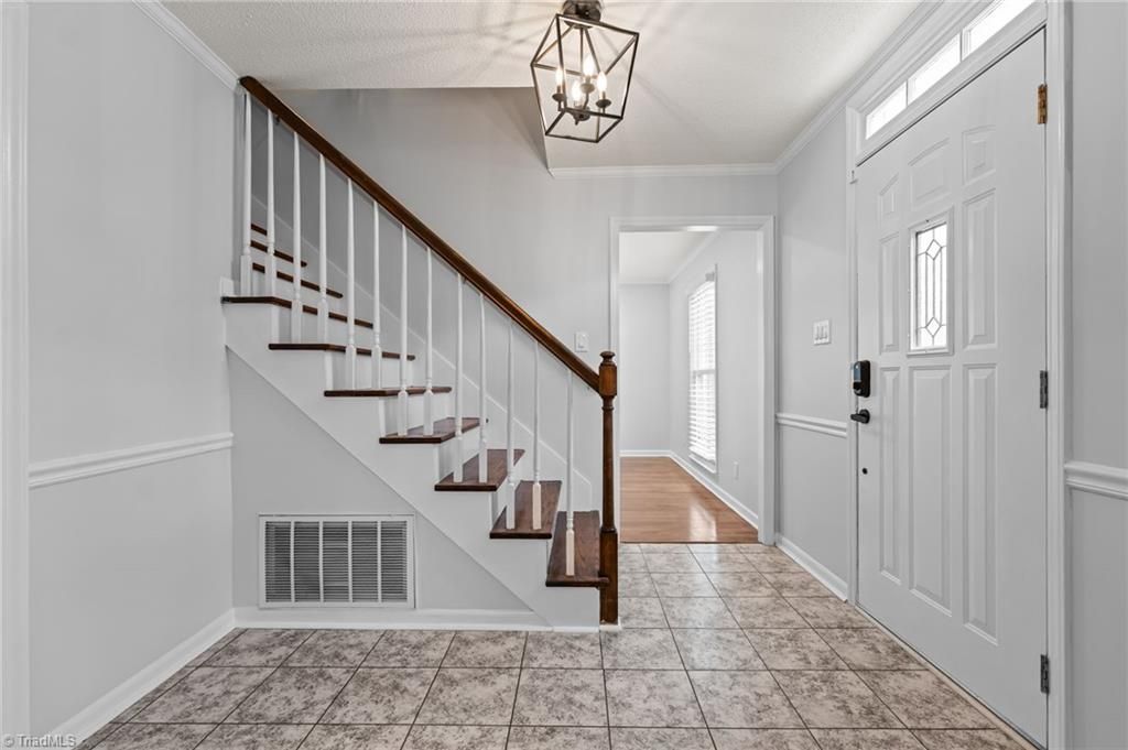 Photo of 405 Miltwood Drive, Greensboro, NC 27455 (MLS # 1210277)