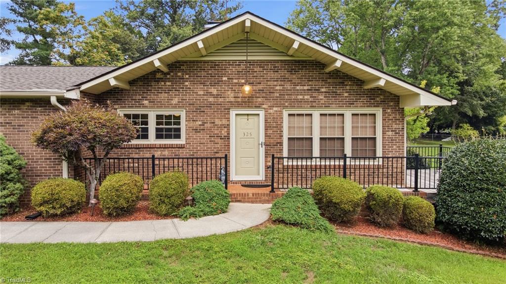 Photo of 325 Spring Street, Yadkinville, NC 27055 (MLS # 1230218)