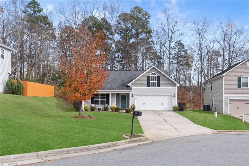 Photo of 1941 Pavilion Drive, Whitsett, NC 27377 (MLS # 1203005)