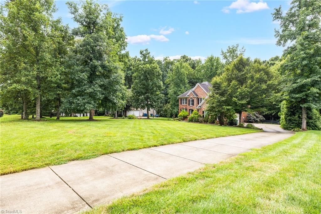 Photo of 8241 William Wallace Drive, Summerfield, NC 27358 (MLS # 1207070)