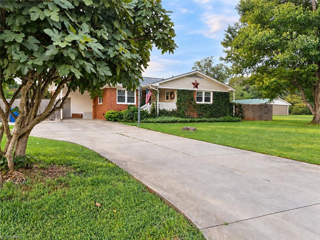 Photo of 910 Pine Knoll Street, Liberty, NC 27298 (MLS # 1234768)