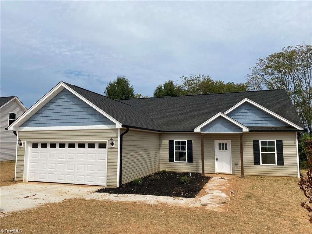 Photo of 411 E Lee Avenue, Yadkinville, NC 27055 (MLS # 1217250)