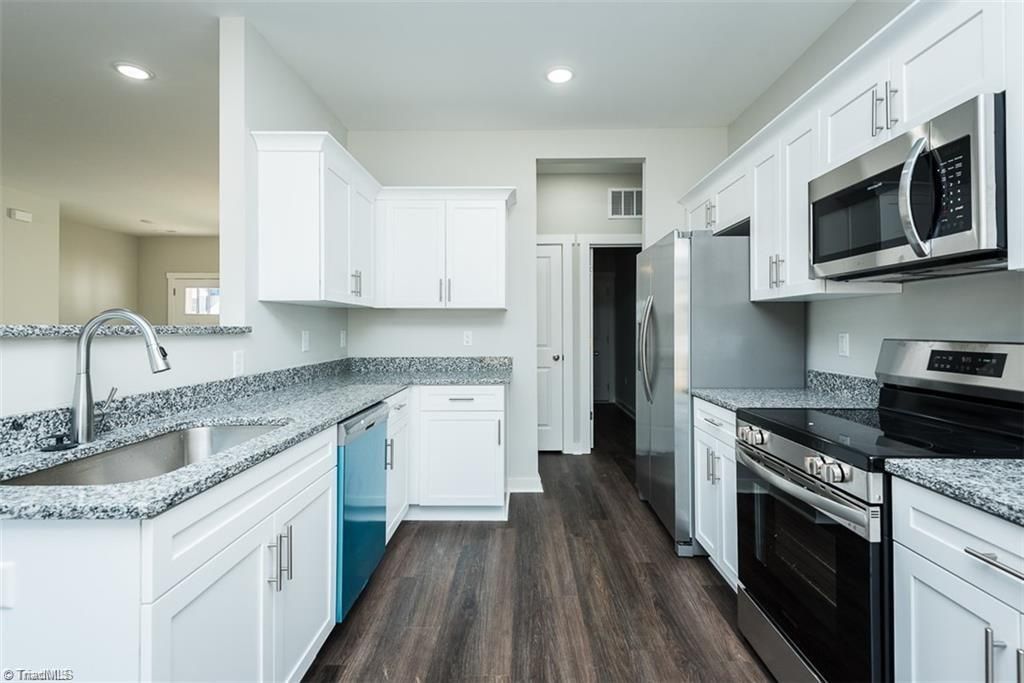 Photo of 411 E Lee Avenue, Yadkinville, NC 27055 (MLS # 1217250)